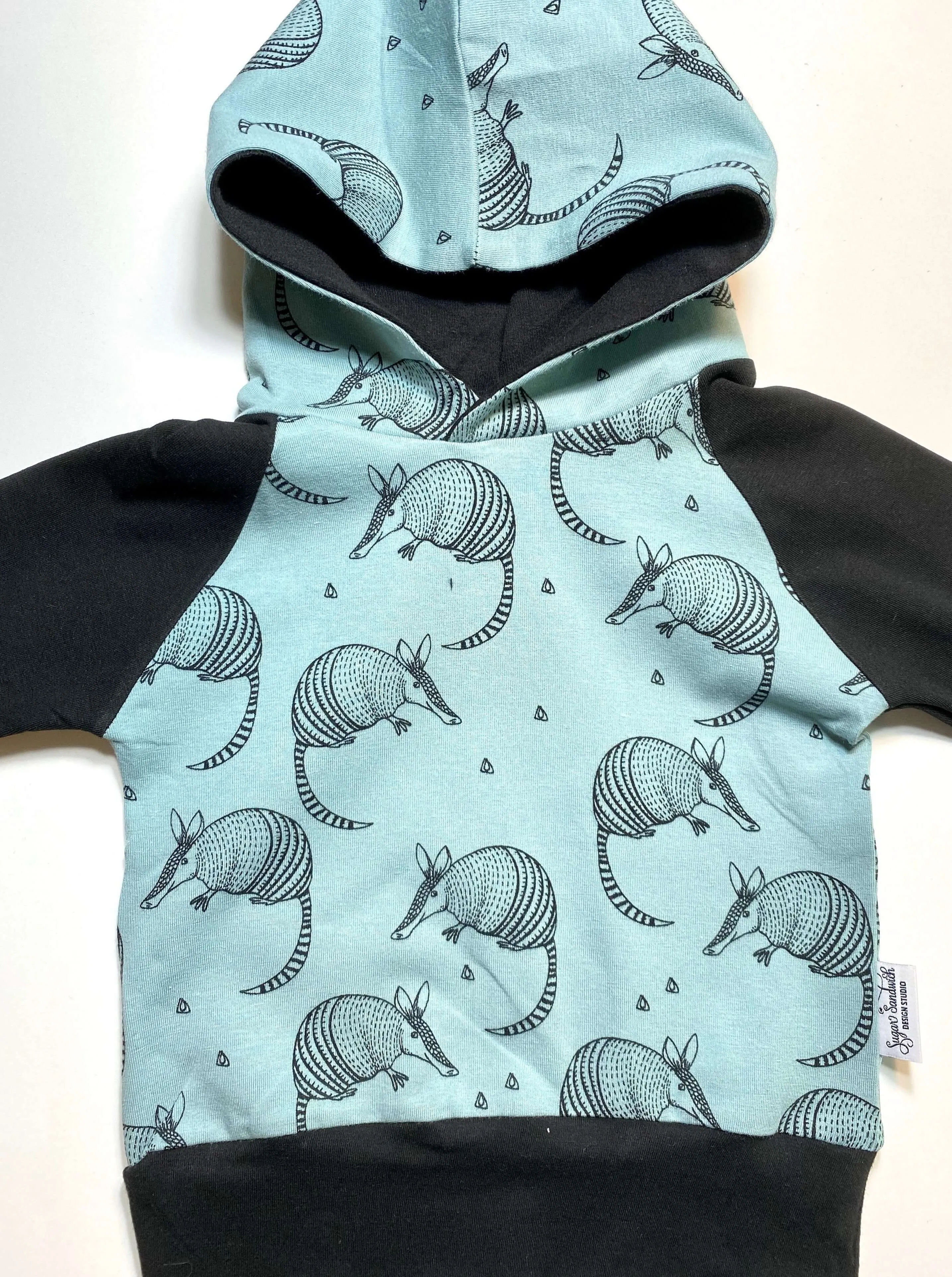 Armadillo Teal Black Gender Neutral Organic Cotton Grow Along Babywear® Hoodie Sweater